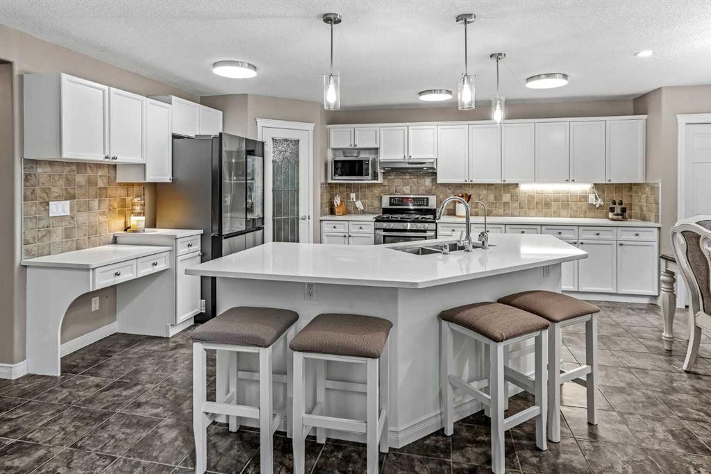 66 Crestmont Drive Sw, Calgary, AB - Indoor Photo Showing Kitchen With Upgraded Kitchen