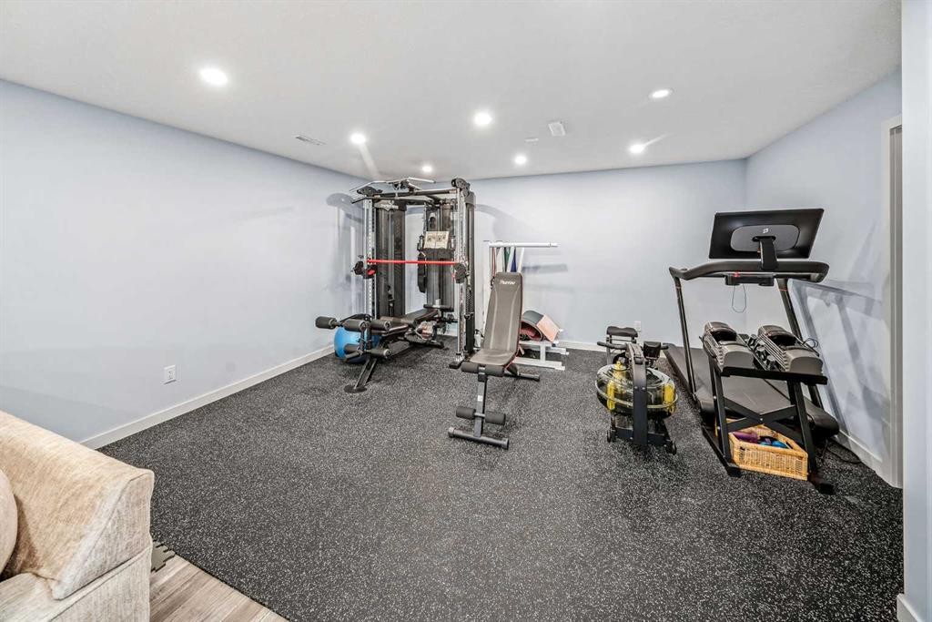 66 Crestmont Drive Sw, Calgary, AB - Indoor Photo Showing Gym Room