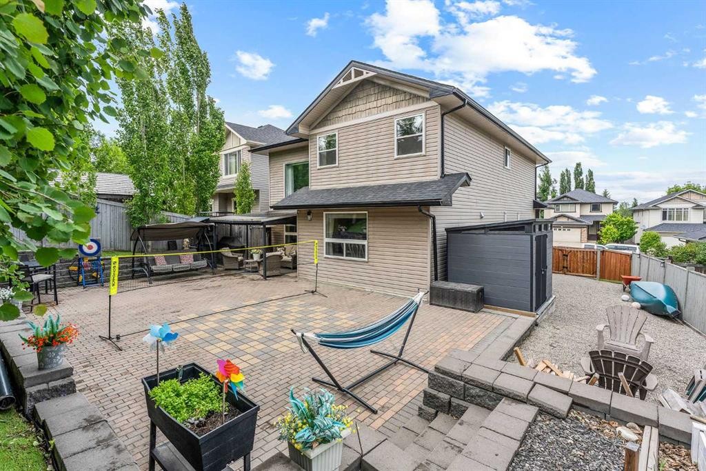 66 Crestmont Drive Sw, Calgary, AB - Outdoor With Deck Patio Veranda With Exterior