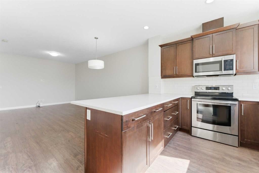 96 Red Embers Crescent Ne, Calgary, AB - Indoor Photo Showing Kitchen With Stainless Steel Kitchen