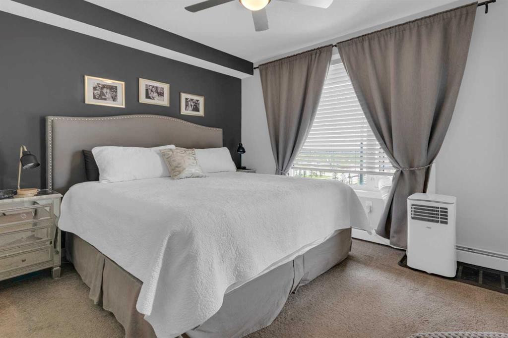 101-30 Shawnee Common Sw, Calgary, AB - Indoor Photo Showing Bedroom