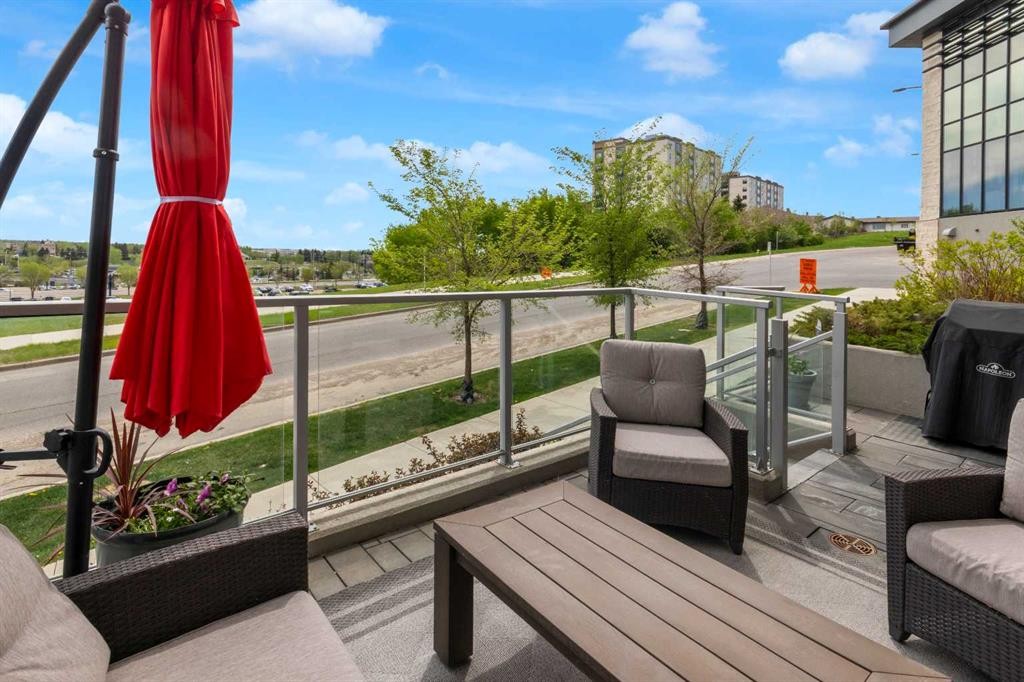 101-30 Shawnee Common Sw, Calgary, AB - Outdoor With Balcony