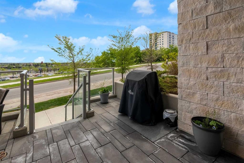 101-30 Shawnee Common Sw, Calgary, AB - Outdoor With Deck Patio Veranda