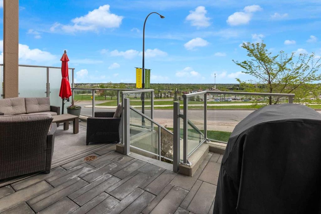 101-30 Shawnee Common Sw, Calgary, AB - Outdoor With Deck Patio Veranda With View