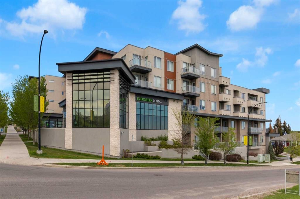 101-30 Shawnee Common Sw, Calgary, AB - Outdoor With Balcony With Facade