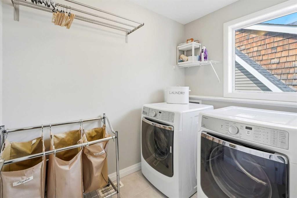 236 Auburn Springs Close Se, Calgary, AB - Indoor Photo Showing Laundry Room
