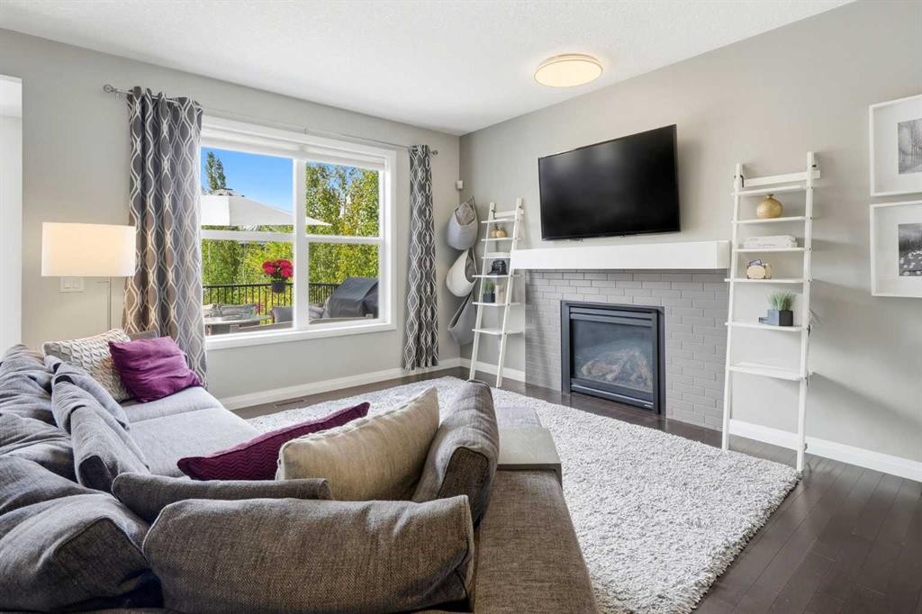 236 Auburn Springs Close Se, Calgary, AB - Indoor Photo Showing Living Room With Fireplace