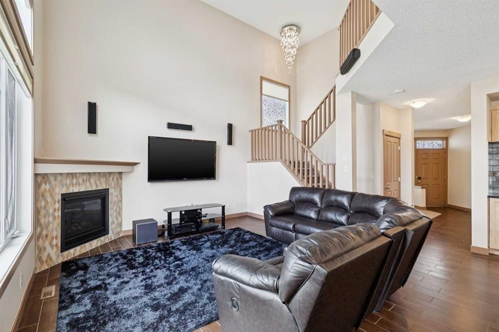 47 Silverado Skies Manor Sw, Calgary, AB - Indoor Photo Showing Living Room With Fireplace