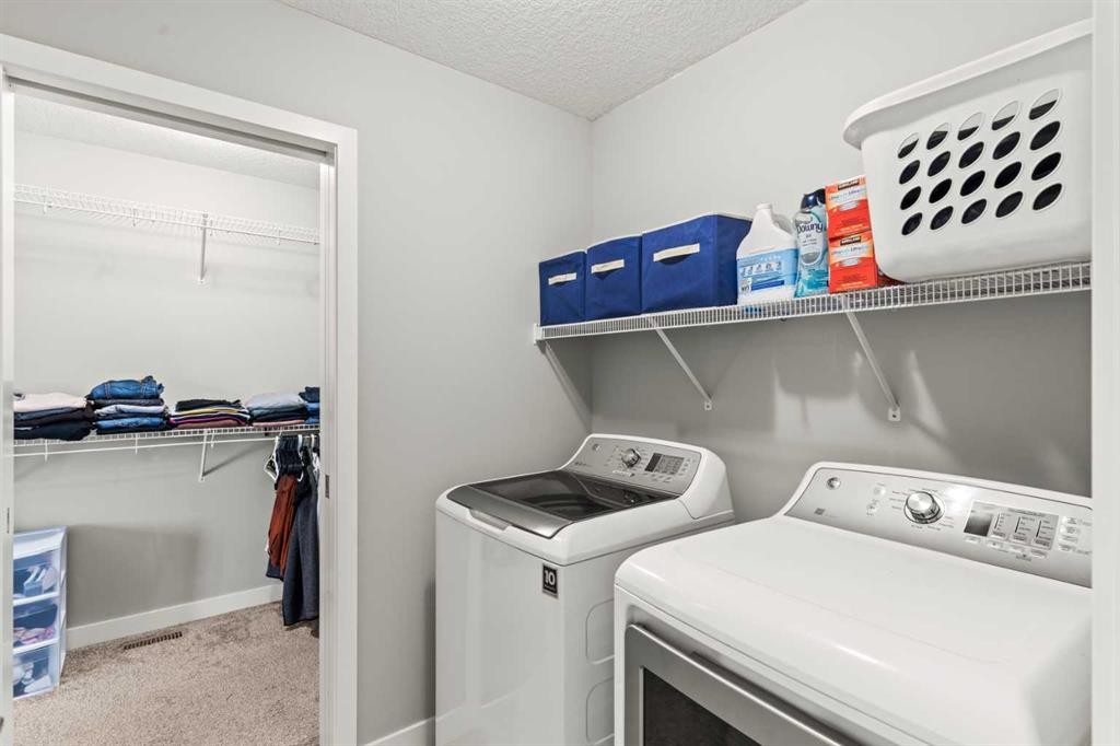 46 Corner Meadows Common Ne, Calgary, AB - Indoor Photo Showing Laundry Room