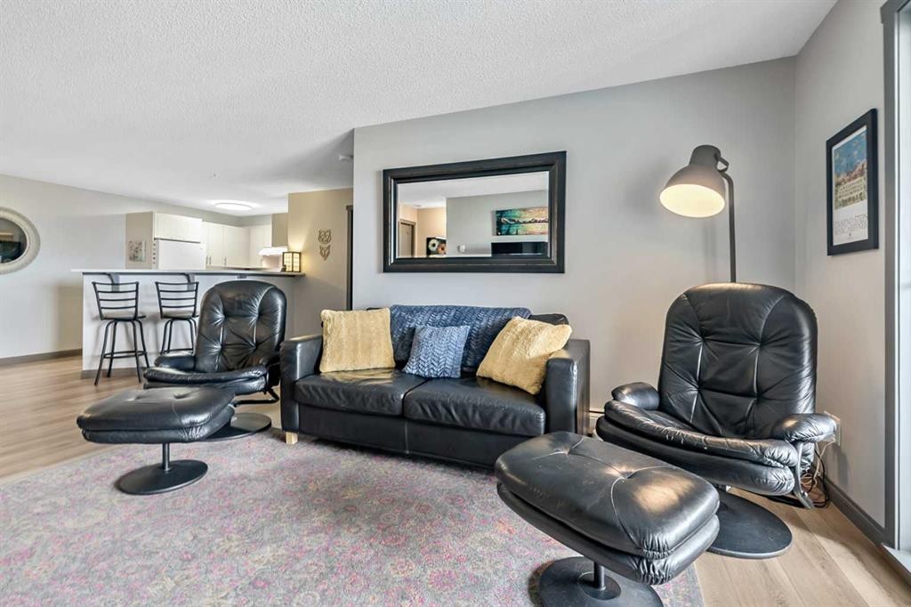 2307-12 Cimarron Common, Okotoks, AB - Indoor Photo Showing Living Room