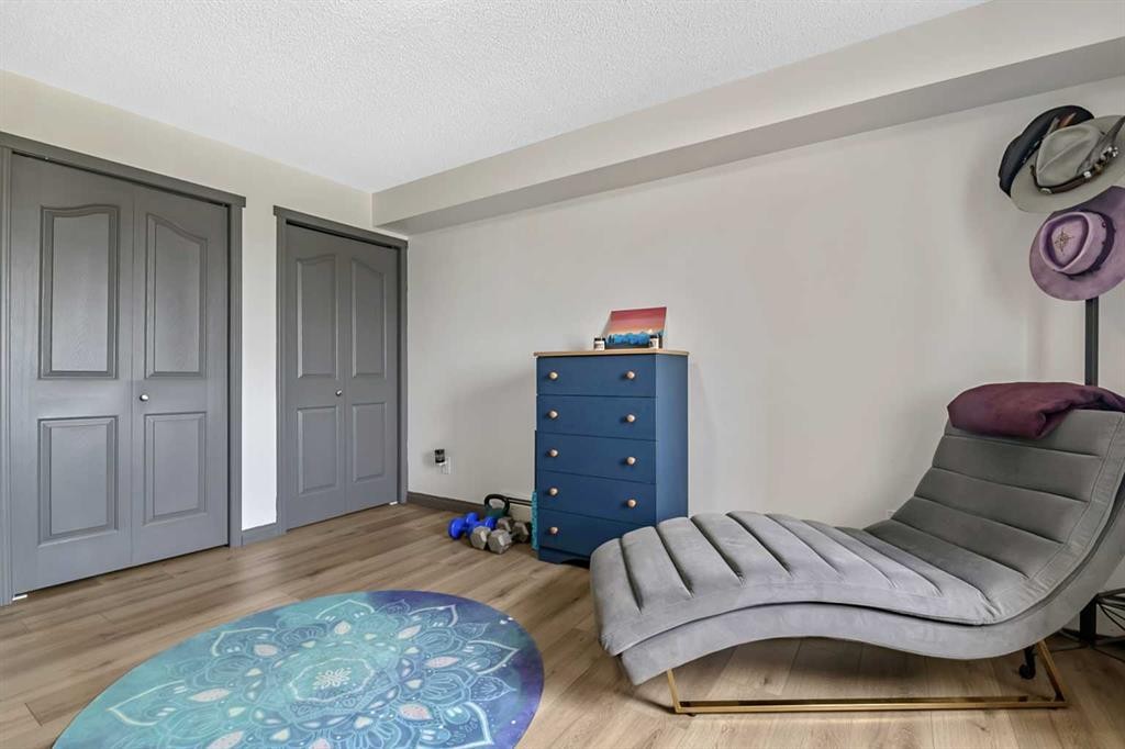 2307-12 Cimarron Common, Okotoks, AB - Indoor Photo Showing Bedroom