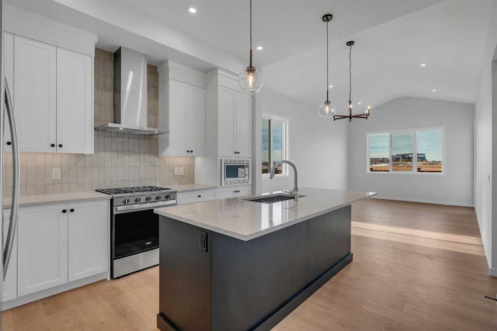 107 Bartlett Row Se, Calgary, AB - Indoor Photo Showing Kitchen With Upgraded Kitchen