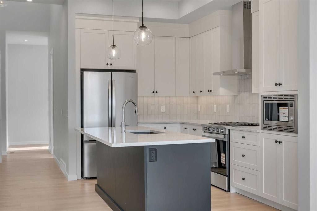 107 Bartlett Row Se, Calgary, AB - Indoor Photo Showing Kitchen With Upgraded Kitchen