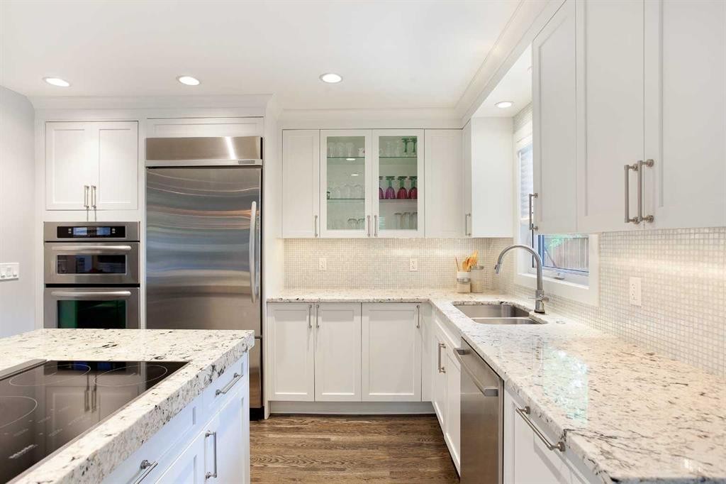 51 Wimbledon Drive Sw, Calgary, AB - Indoor Photo Showing Kitchen With Double Sink With Upgraded Kitchen