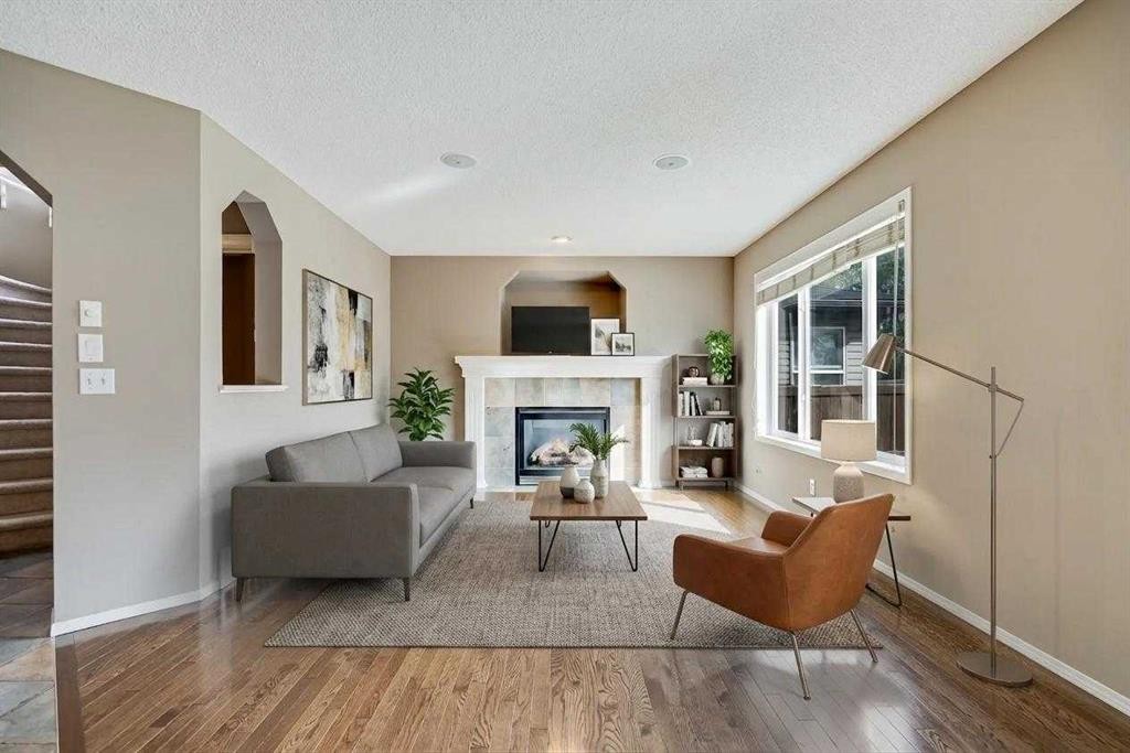 34 Kincora Drive Nw, Calgary, AB - Indoor Photo Showing Living Room With Fireplace