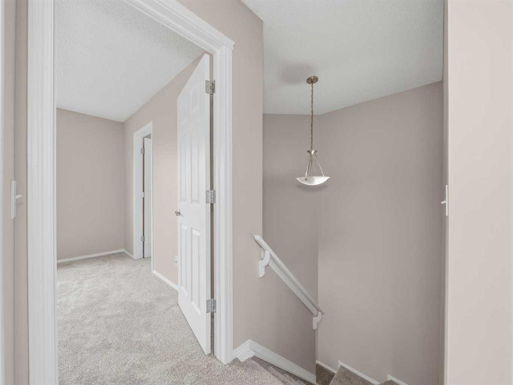 128 Taradale Drive Ne, Calgary, AB - Indoor Photo Showing Other Room