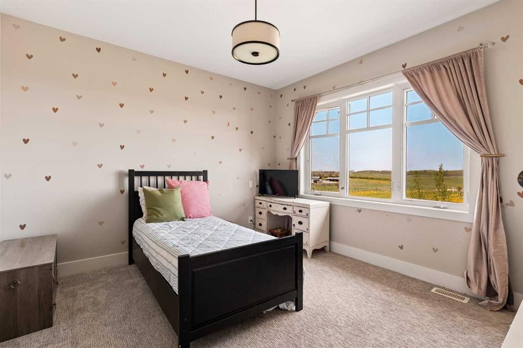 14 Silverhorn Park, Rural Rocky View County, AB - Indoor Photo Showing Bedroom