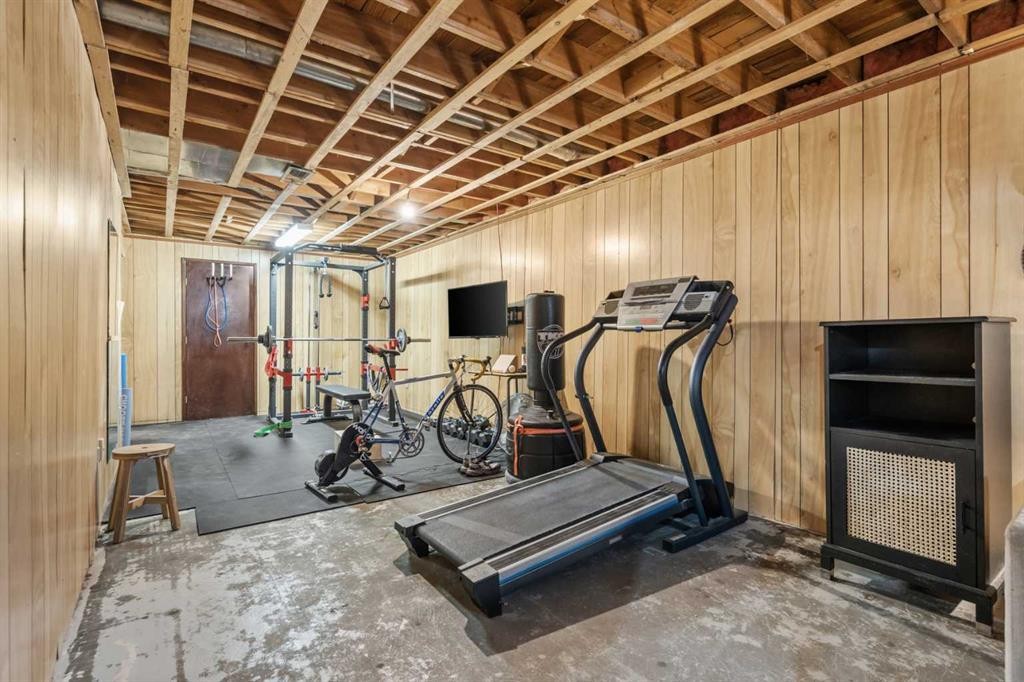 240 Lynnview Way Se, Calgary, AB - Indoor Photo Showing Gym Room
