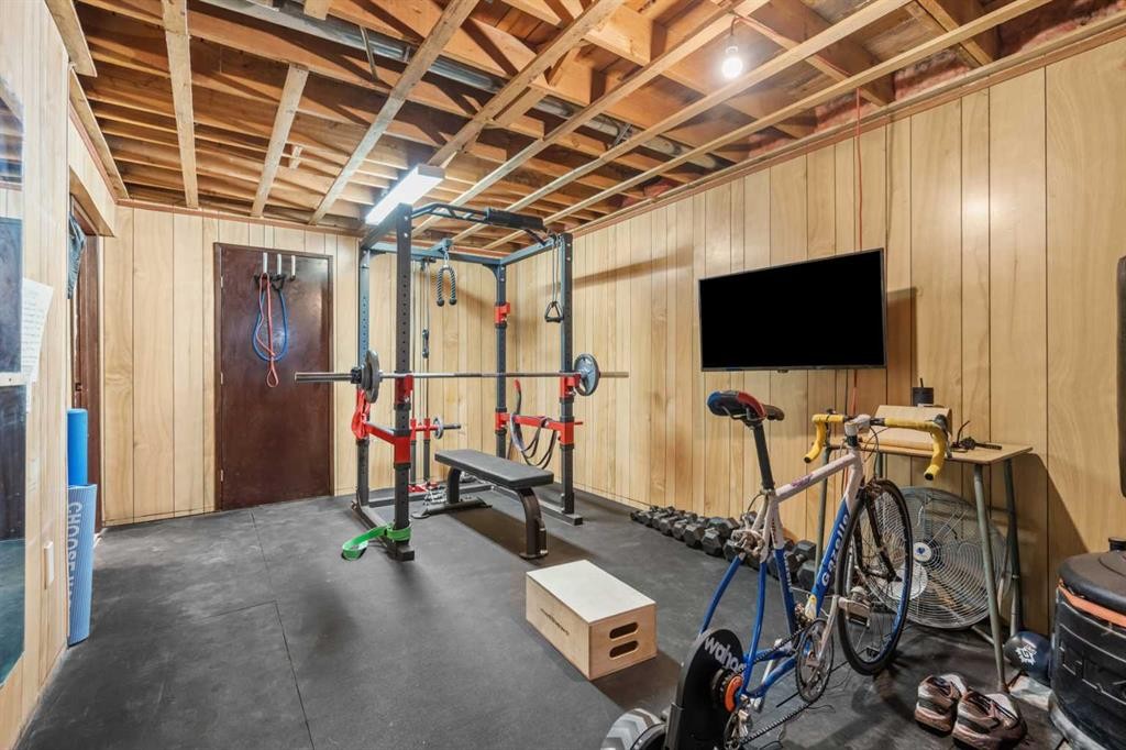 240 Lynnview Way Se, Calgary, AB - Indoor Photo Showing Gym Room