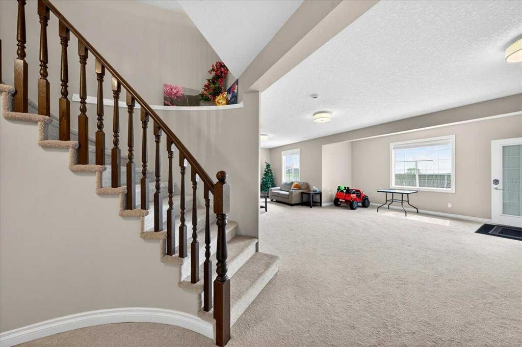 248 Rainbow Falls Way, Chestermere, AB - Indoor Photo Showing Other Room