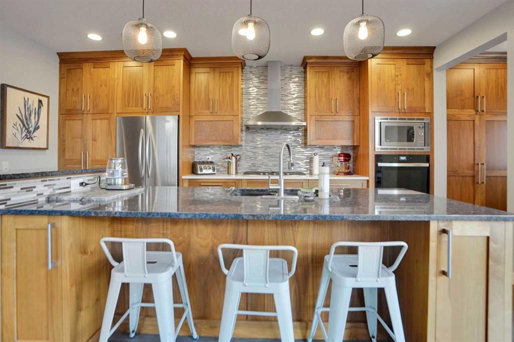 145 Marquis Common Se, Calgary, AB - Indoor Photo Showing Kitchen With Stainless Steel Kitchen With Upgraded Kitchen