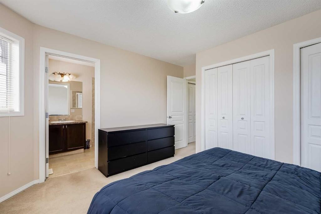 31 Taralake Gardens Ne, Calgary, AB - Indoor Photo Showing Bedroom