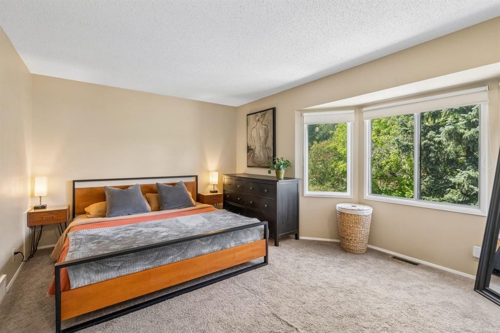 47 Cedargrove Way Sw, Calgary, AB - Indoor Photo Showing Bedroom