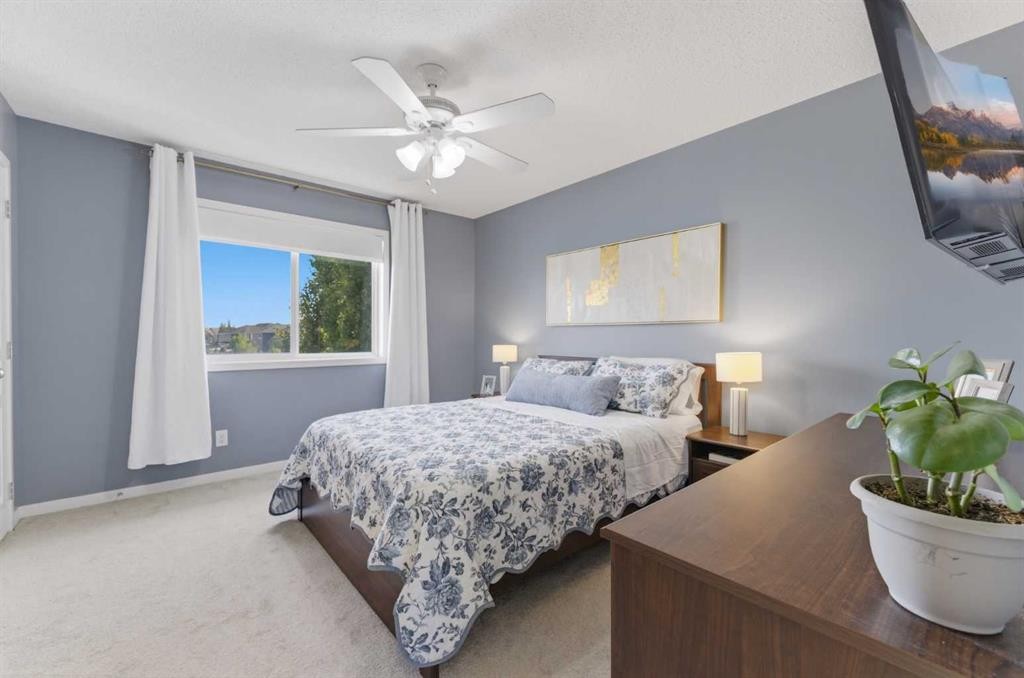 394 Copperpond Boulevard Se, Calgary, AB - Indoor Photo Showing Bedroom