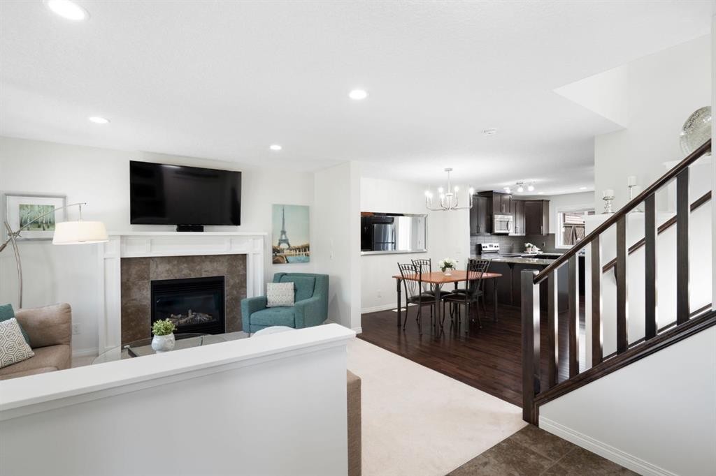 54 Legacy Common Se, Calgary, AB - Indoor Photo Showing Other Room With Fireplace