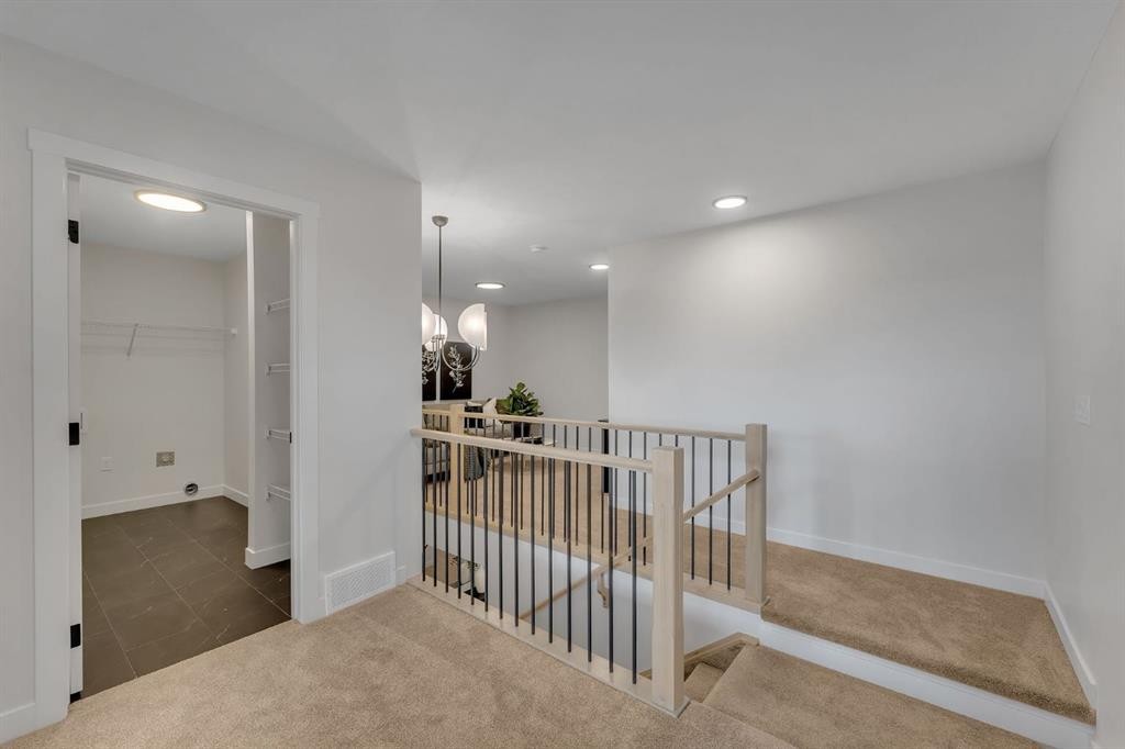 445 Lewiston Landing Ne, Calgary, AB - Indoor Photo Showing Other Room
