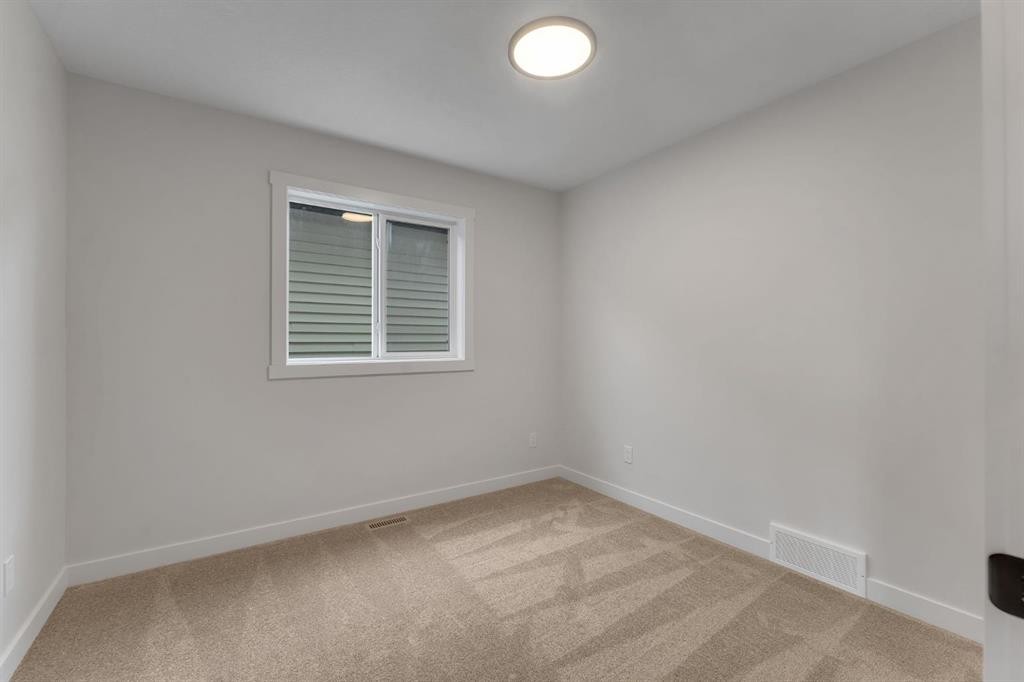 445 Lewiston Landing Ne, Calgary, AB - Indoor Photo Showing Other Room