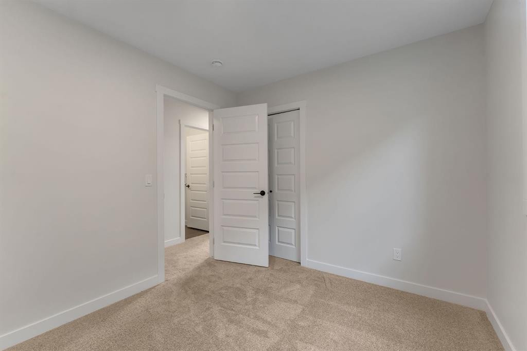 445 Lewiston Landing Ne, Calgary, AB - Indoor Photo Showing Other Room