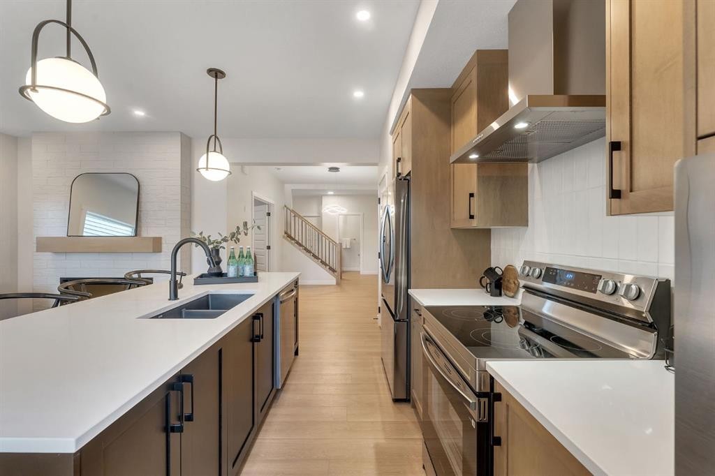445 Lewiston Landing Ne, Calgary, AB - Indoor Photo Showing Kitchen With Double Sink With Upgraded Kitchen