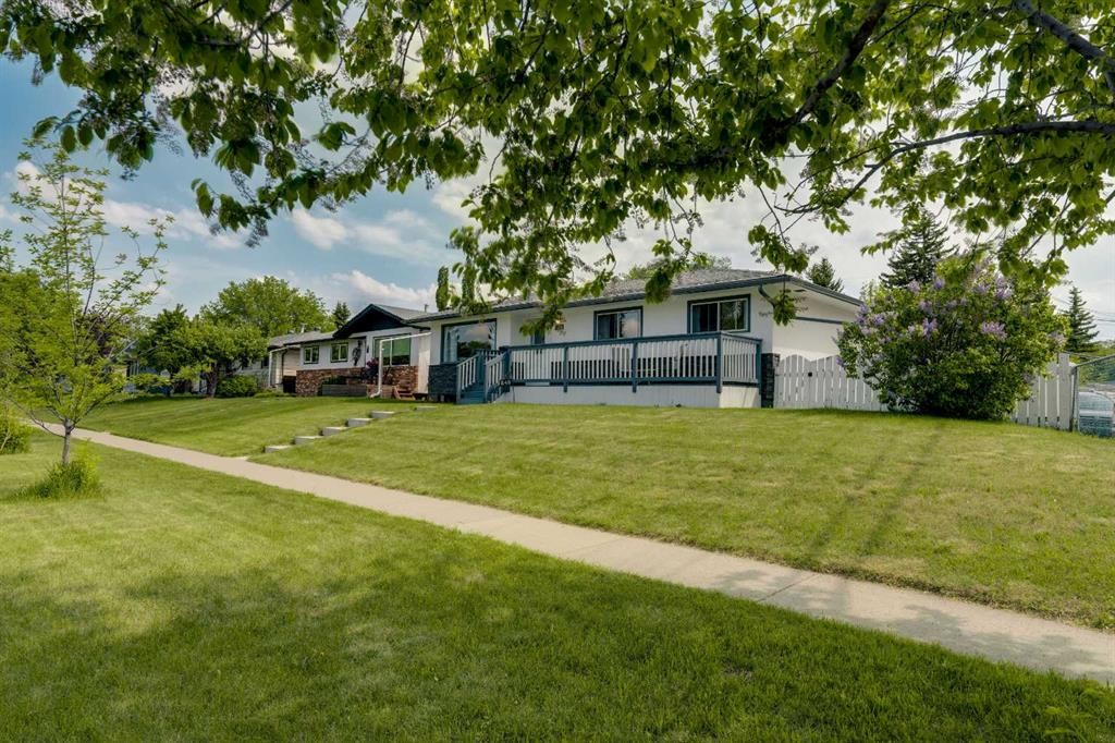 249 Acadia Drive Se, Calgary, AB - Outdoor With Deck Patio Veranda