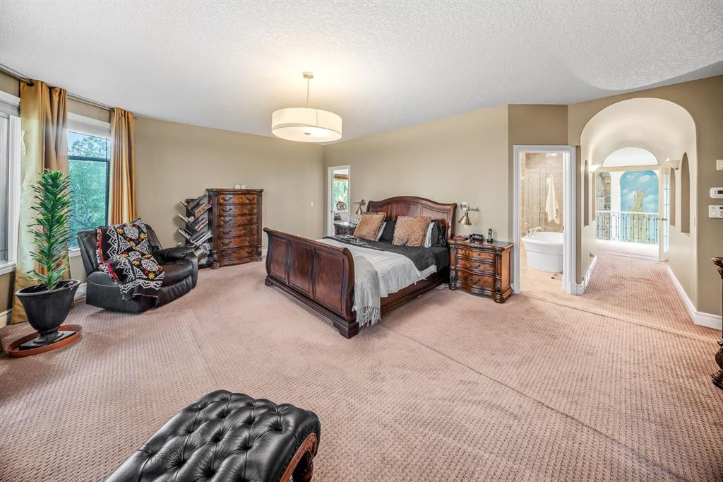 40 Blueridge Bay, Rural Rocky View County, AB - Indoor Photo Showing Bedroom