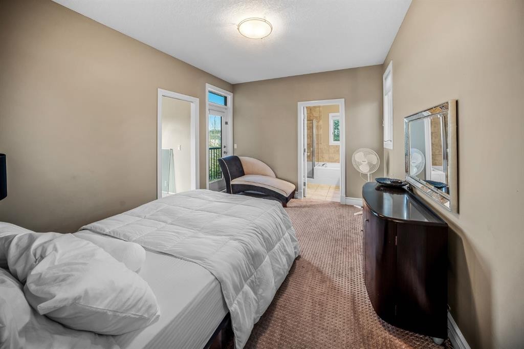 40 Blueridge Bay, Rural Rocky View County, AB - Indoor Photo Showing Bedroom