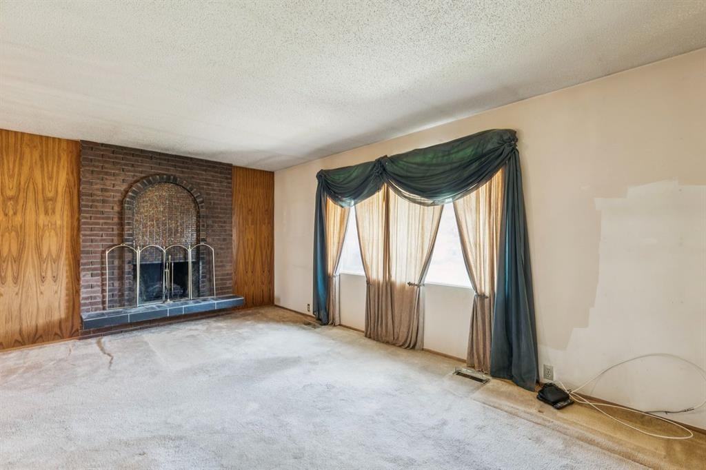 1132 Hunterston Hill Nw, Calgary, AB - Indoor With Fireplace