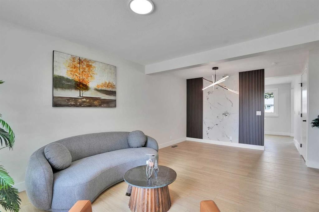 74 Castledale Way Ne, Calgary, AB - Indoor Photo Showing Living Room