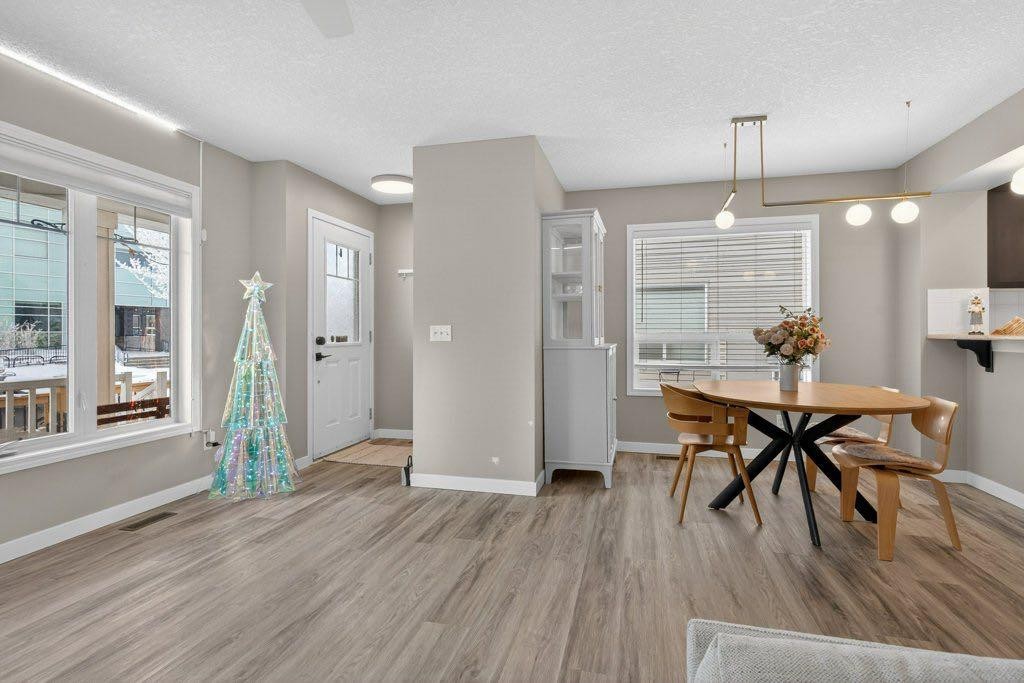 1012 Windsong Drive Sw, Airdrie, AB - Indoor Photo Showing Dining Room