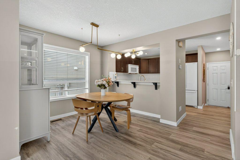 1012 Windsong Drive Sw, Airdrie, AB - Indoor Photo Showing Dining Room