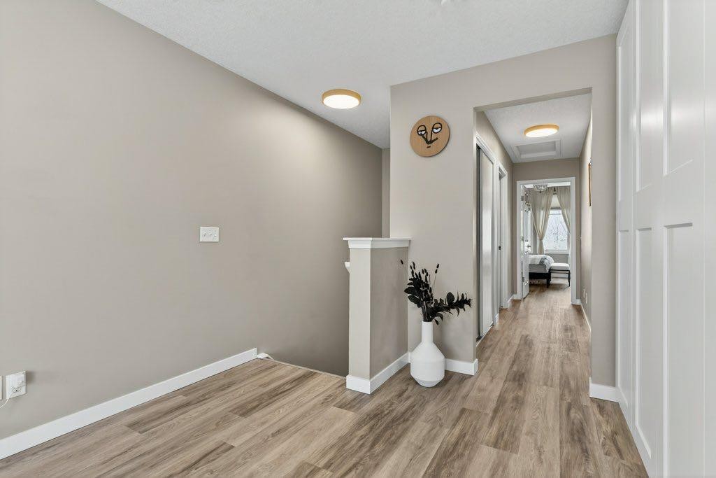 1012 Windsong Drive Sw, Airdrie, AB - Indoor Photo Showing Other Room
