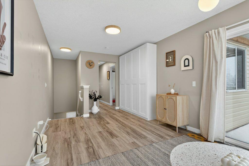 1012 Windsong Drive Sw, Airdrie, AB - Indoor Photo Showing Other Room