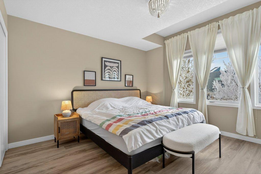 1012 Windsong Drive Sw, Airdrie, AB - Indoor Photo Showing Bedroom