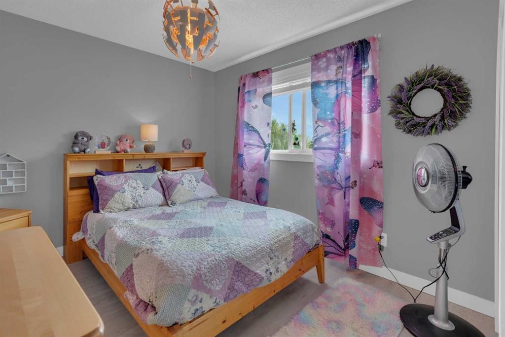 67 Deersaxon Circle Se, Calgary, AB - Indoor Photo Showing Bedroom