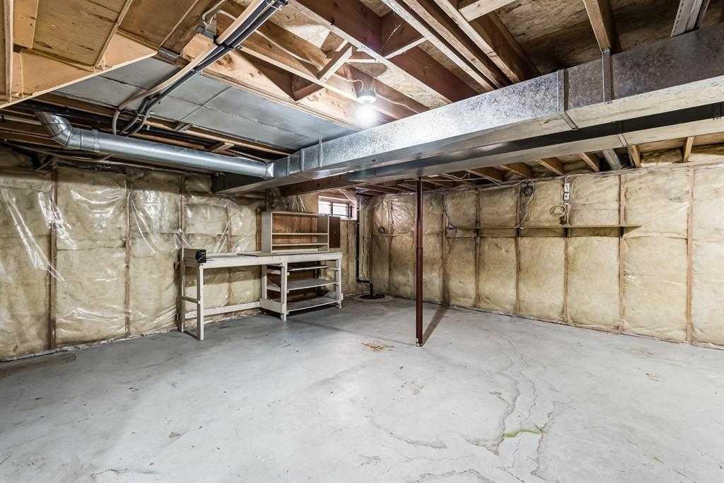 67 Deersaxon Circle Se, Calgary, AB - Indoor Photo Showing Basement