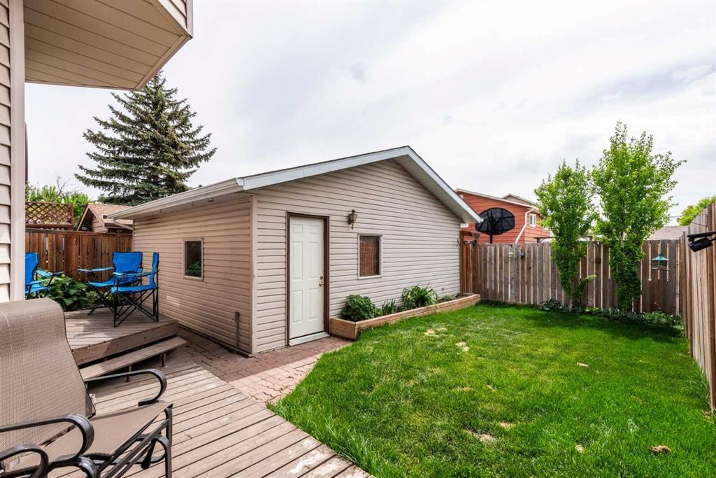 67 Deersaxon Circle Se, Calgary, AB - Outdoor With Deck Patio Veranda With Exterior