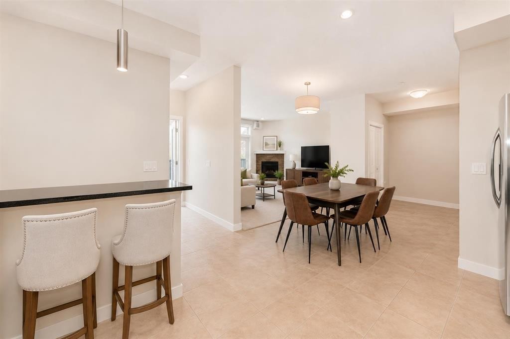 210-1005A Westmount Drive, Strathmore, AB - Indoor Photo Showing Dining Room