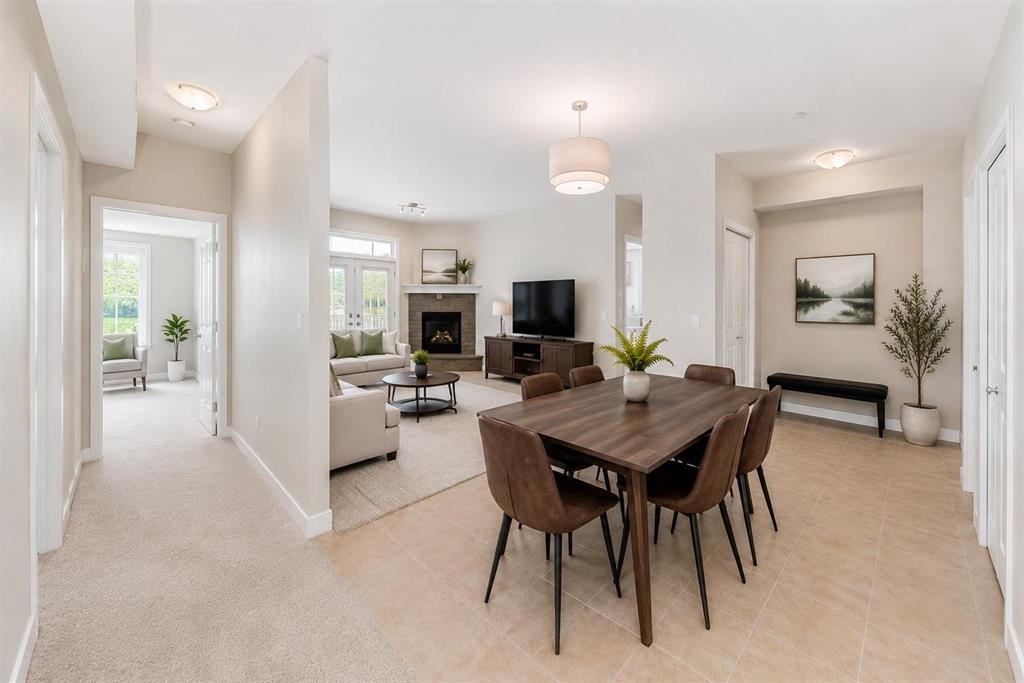 210-1005A Westmount Drive, Strathmore, AB - Indoor With Fireplace