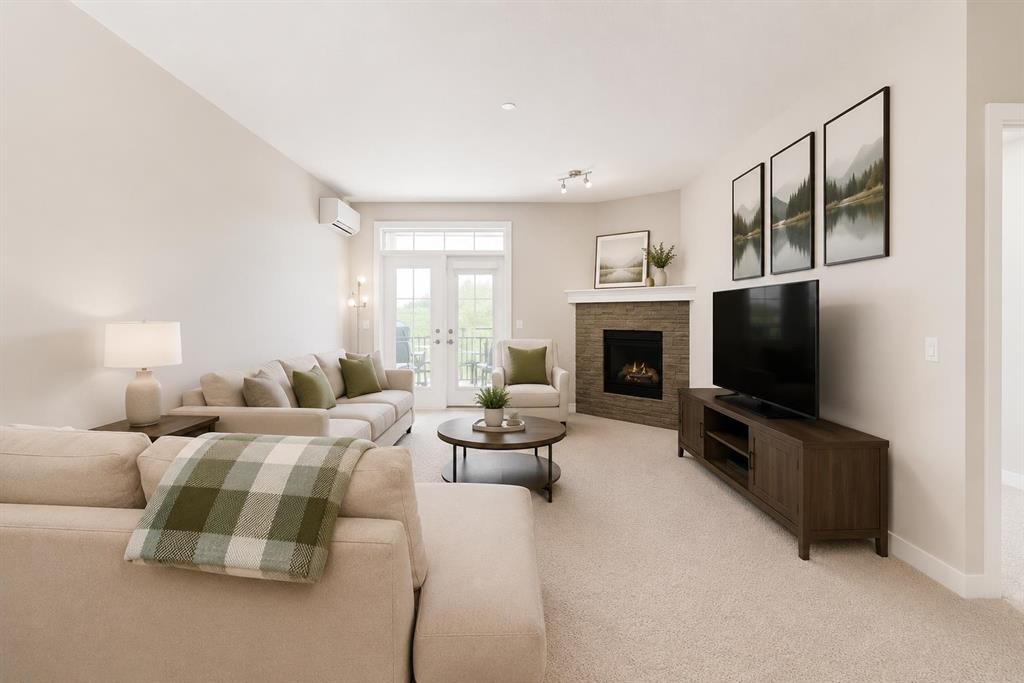 210-1005A Westmount Drive, Strathmore, AB - Indoor Photo Showing Living Room With Fireplace