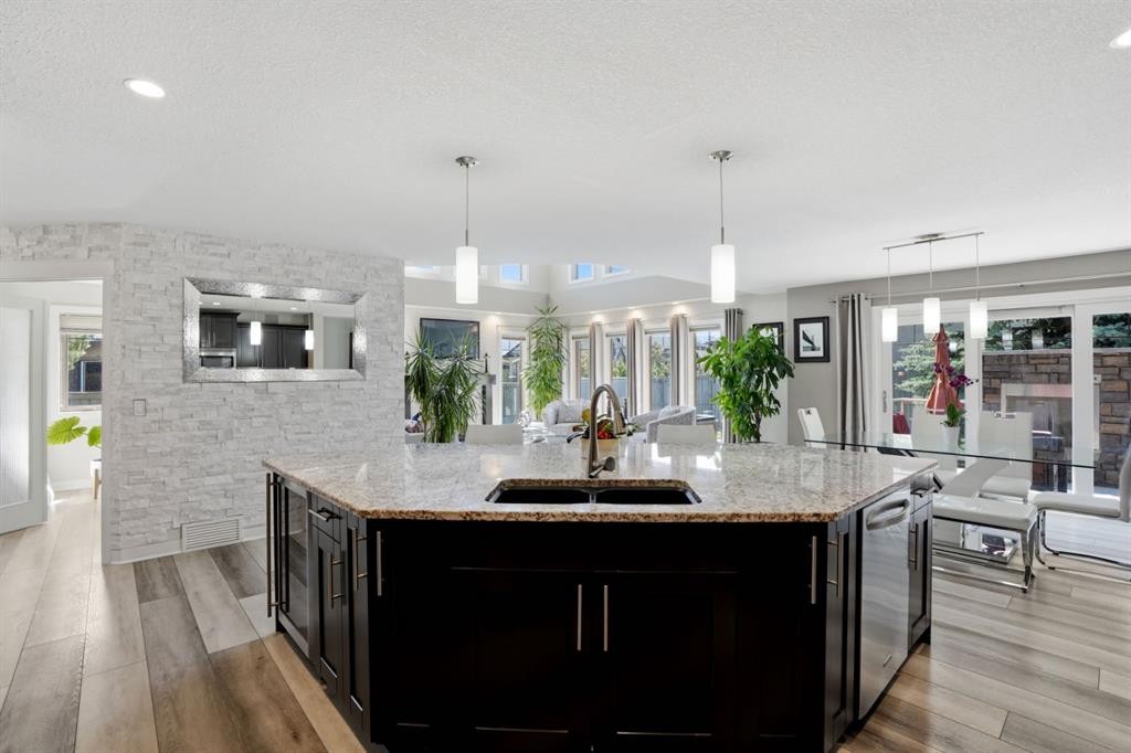 105 Cranridge Heights Se, Calgary, AB - Indoor Photo Showing Kitchen With Double Sink With Upgraded Kitchen